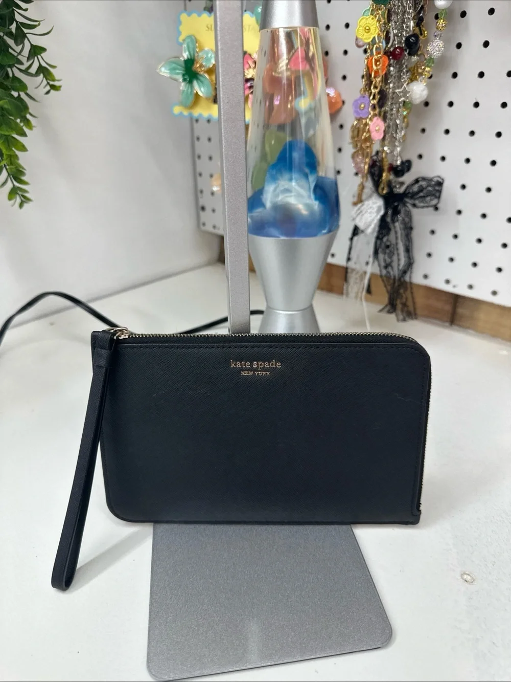 kate spade black leather zip wristlet with gold logo